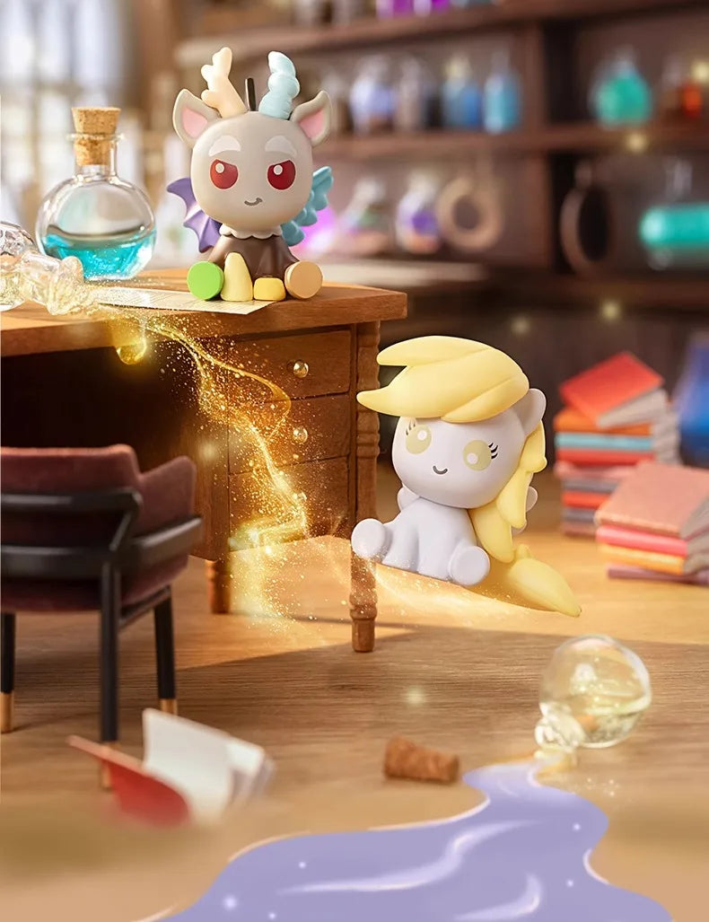 A collectible figurine of a pony with light blue accents sits on a wooden surface next to a glass bottle.