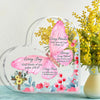 Heart-shaped acrylic decor featuring pink and yellow floral designs with inspirational Bible verses