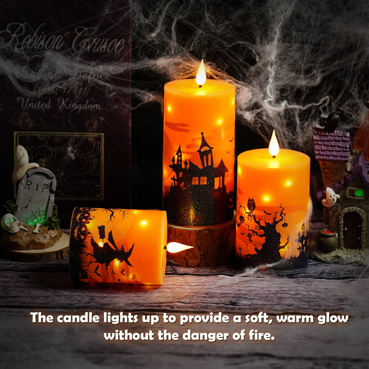 A collection of glowing orange pillar candles set against a dark background for Halloween decor.