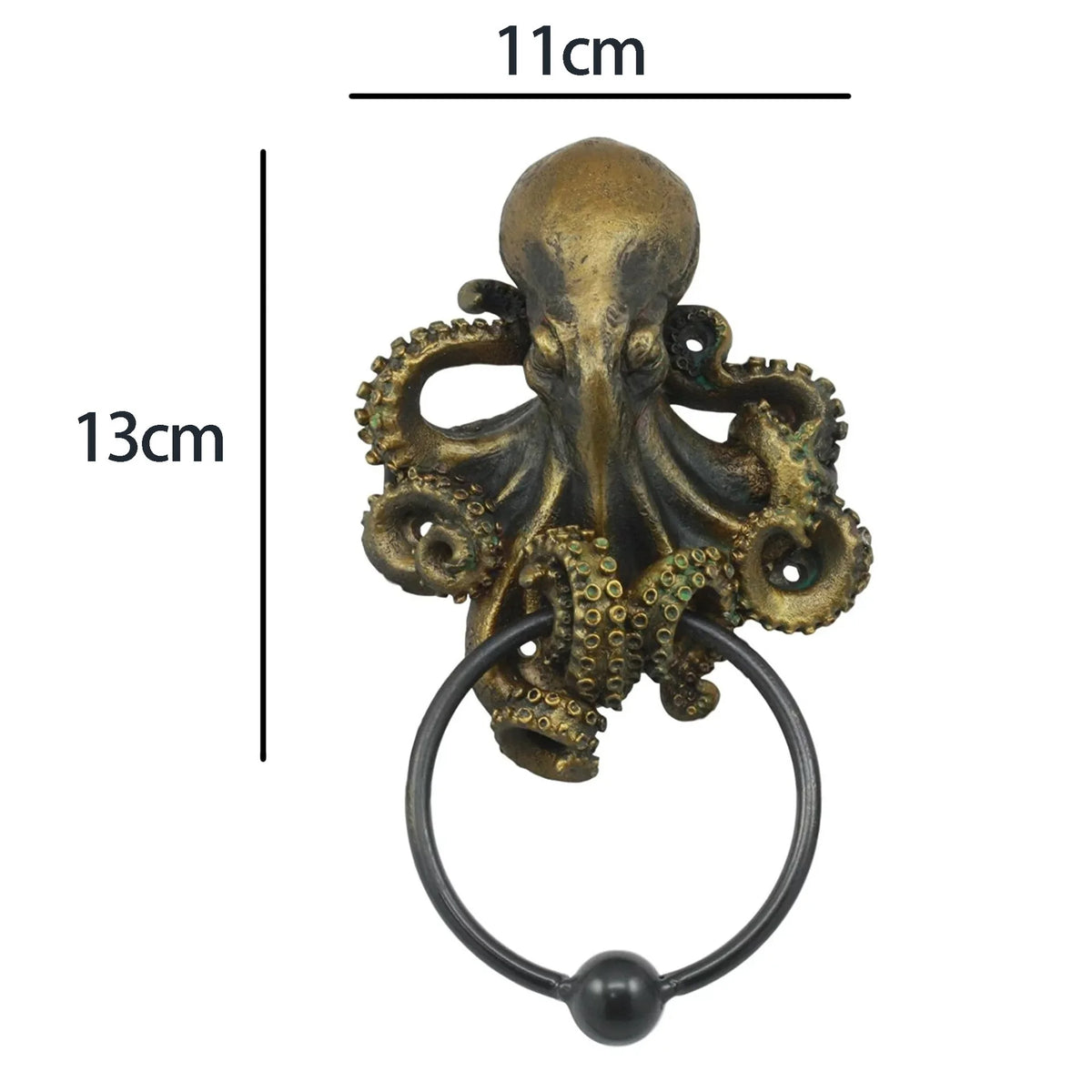 A bronze-colored octopus skull door knocker with a cast iron ring.