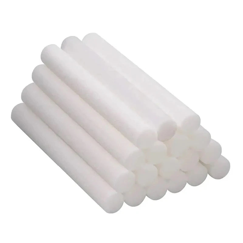 A bundle of white foam flower arrangement cylinders for wedding centerpieces.