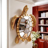 Golden sea turtle resin wall decor mirror mounted on a white wall