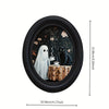 Oval framed wall art depicting a ghostly figure and a black cat in a dark floral setting