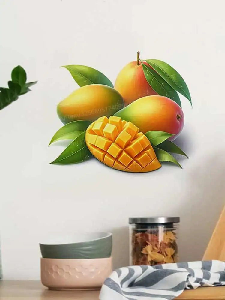 A decorative wall sticker featuring an orange mango fruit and green leaves.