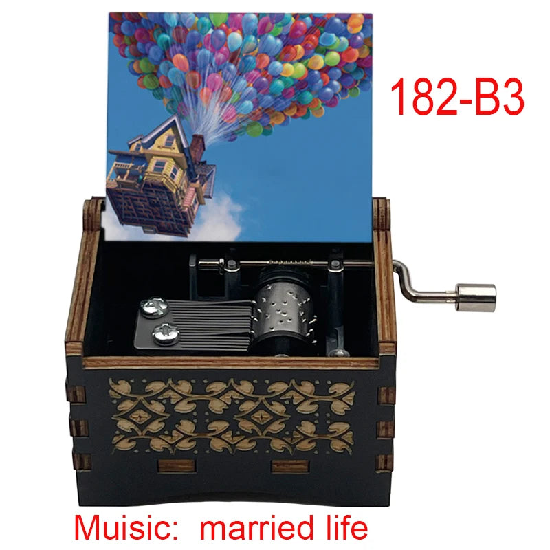 A wooden music box with a lid showing a colorful balloon display, featuring the title Music: married life.