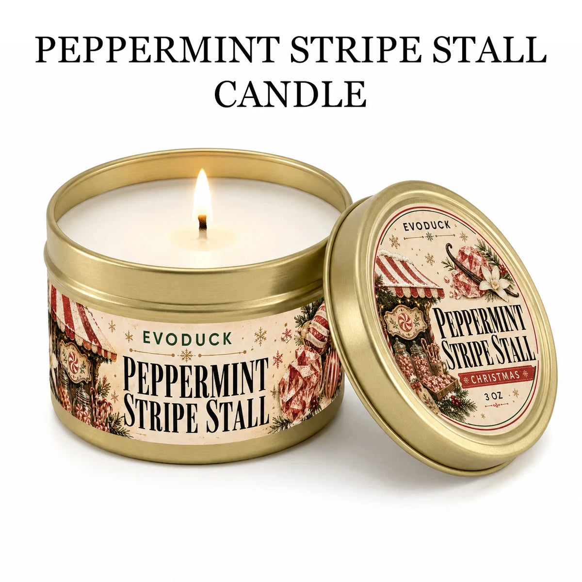 A gold tin candle labeled Peppermint Stripe Stall with a lit wick and a matching gift box.