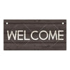 A dark wooden sign with the word WELCOME carved or painted in white letters.