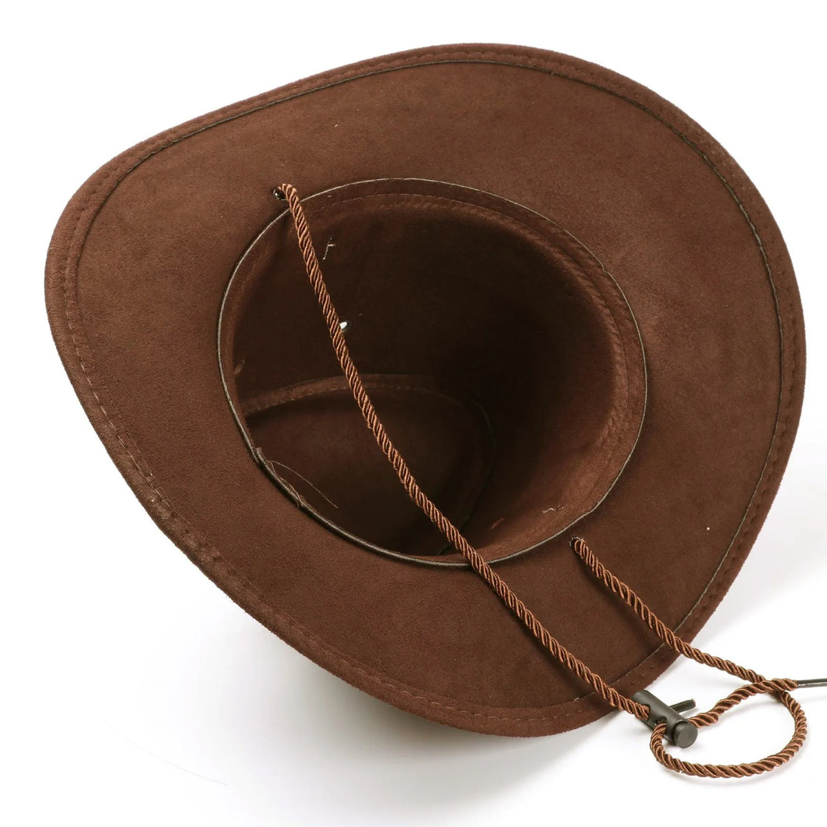 A brown suede western cowboy hat with a leather drawstring attached.