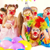 A group of children wearing classic red clown noses and colorful makeup for a costume party.