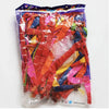 A clear plastic bag filled with colorful latex rocket balloons in various shades of red, orange, yellow, and blue.