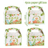 Four paper gift boxes featuring dinosaur illustrations for a party theme