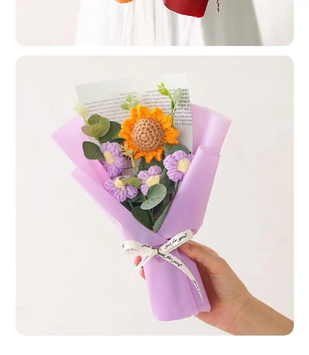 A purple handmade crochet bouquet featuring orange and purple flowers wrapped in sheer cellophane.