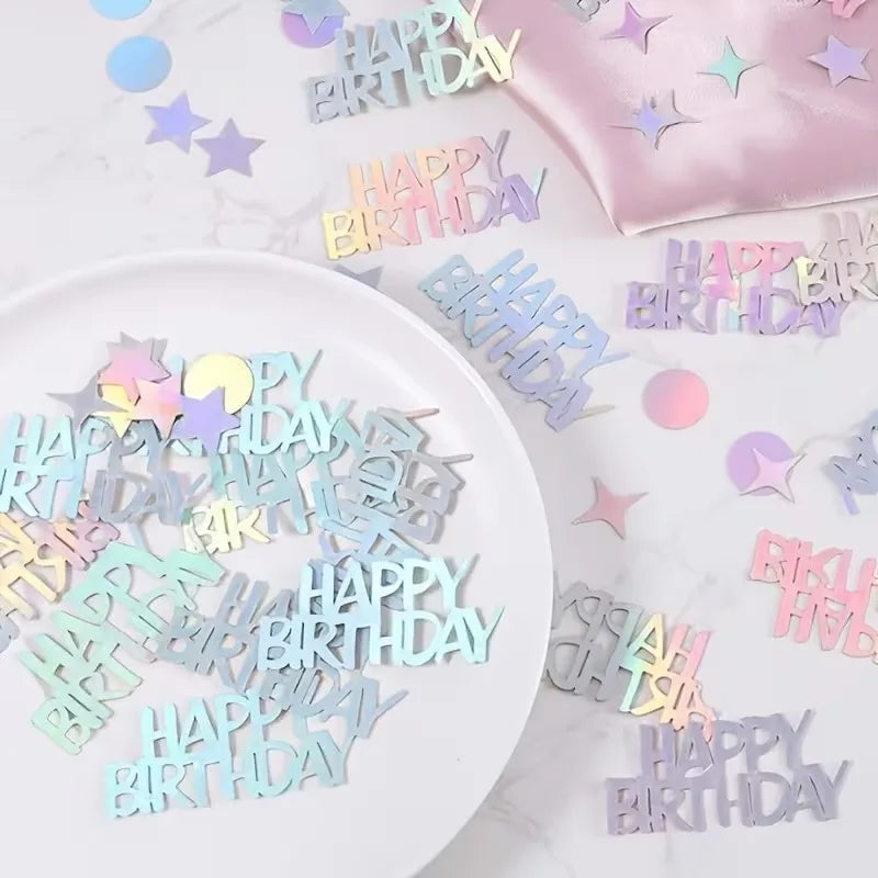 Holographic disco confetti scattered on a white plate and surrounding surface.