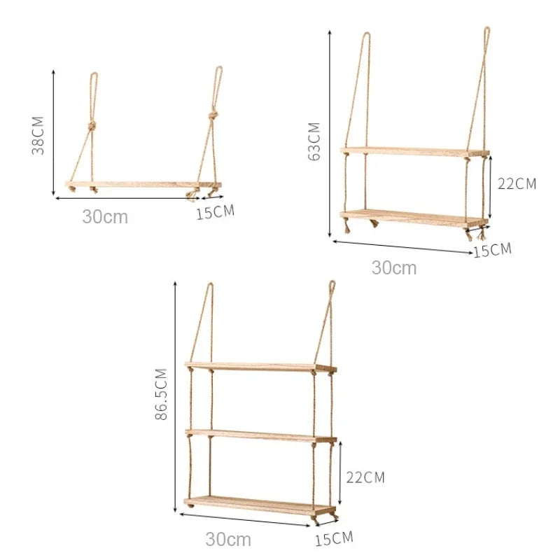 Rustic wooden hanging shelves with rope featuring three tiers and natural wood finish.