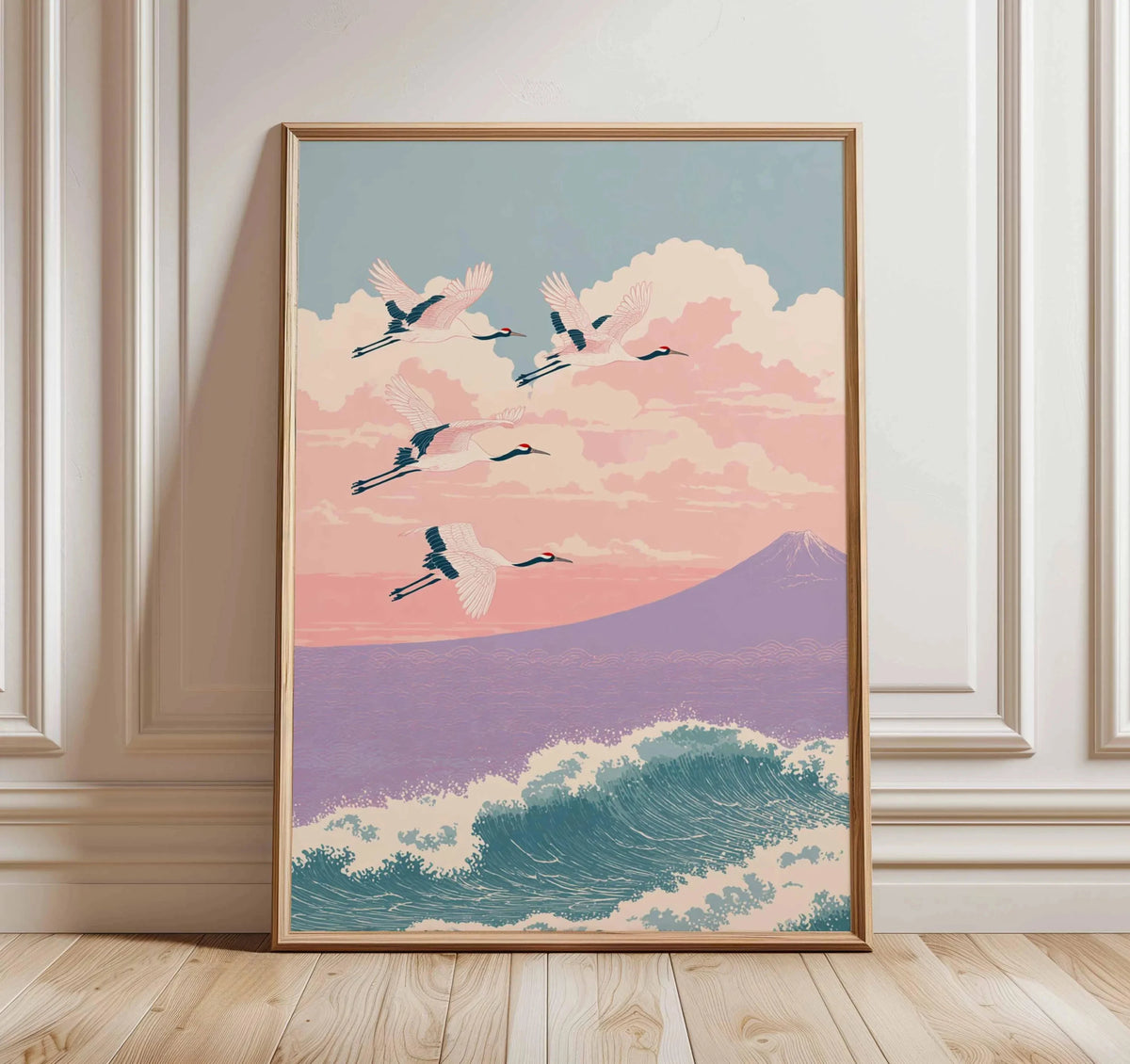 A framed canvas print depicting a flock of white cranes flying against a soft pink and purple sunset sky.