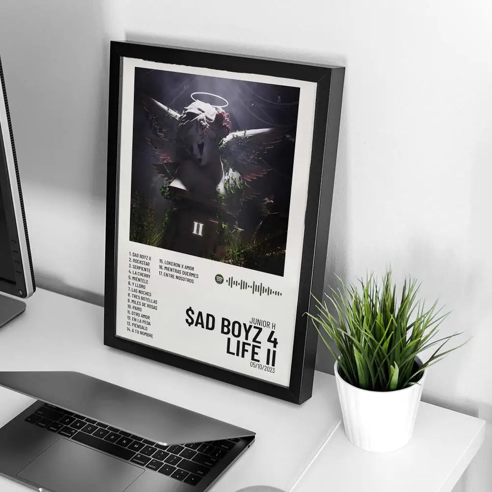 A framed canvas wall art featuring a dark, dramatic image of an angel with wings and a halo.