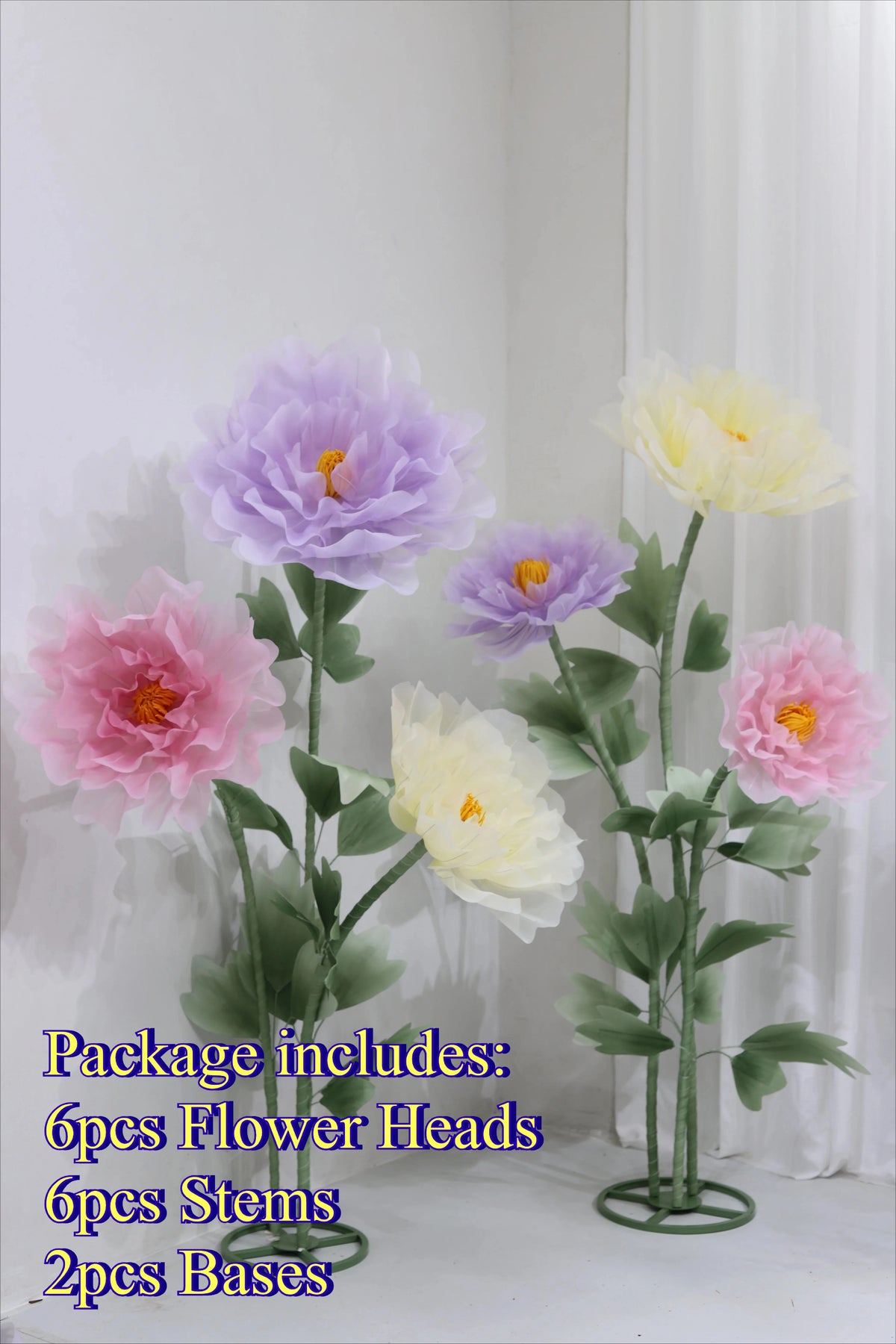 Artificial silk flower arrangement featuring purple and yellow poppy heads on green stems and bases.