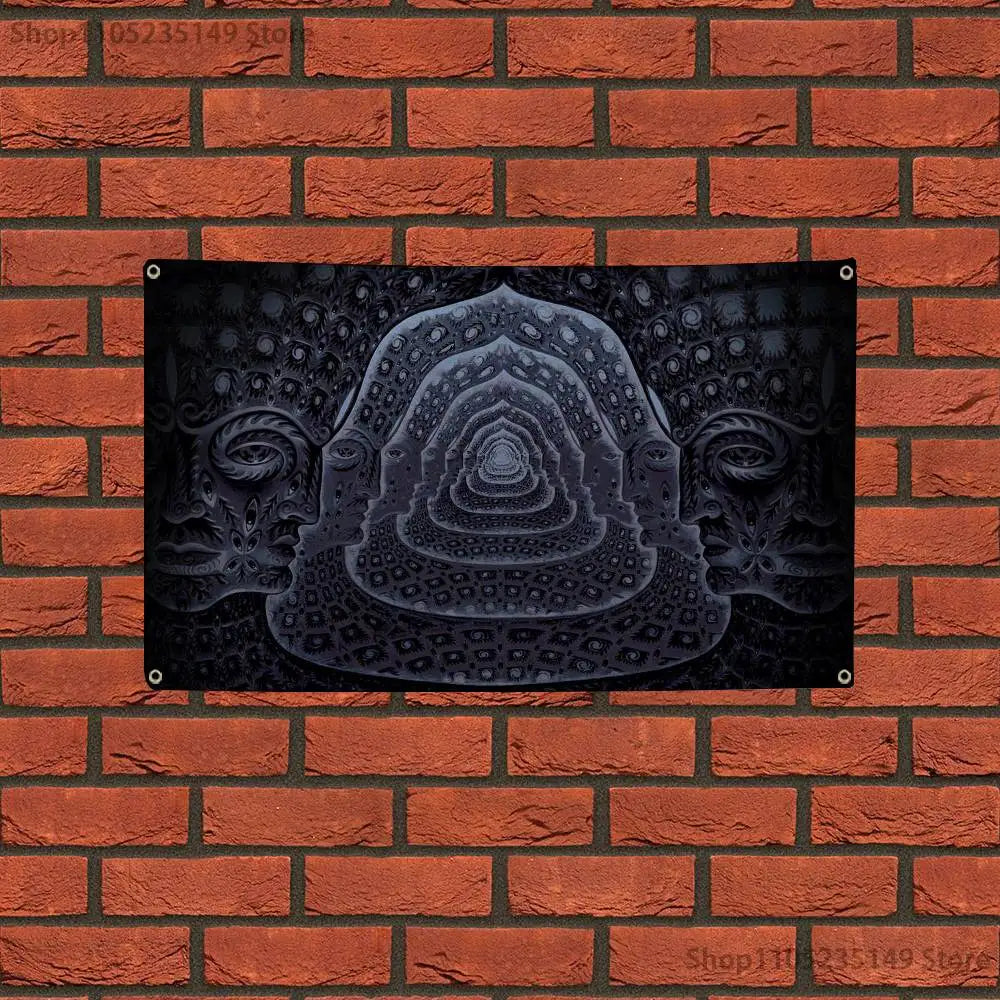 A dark, intricate relief carving of a stylized face or mask is mounted on a brick wall.