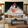 A framed banner featuring a close-up of a chicken's head wearing sunglasses and a pink beak against a dark background.