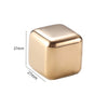 A square, polished gold-toned stainless steel ice cube with dimensions of 27mm on each side.