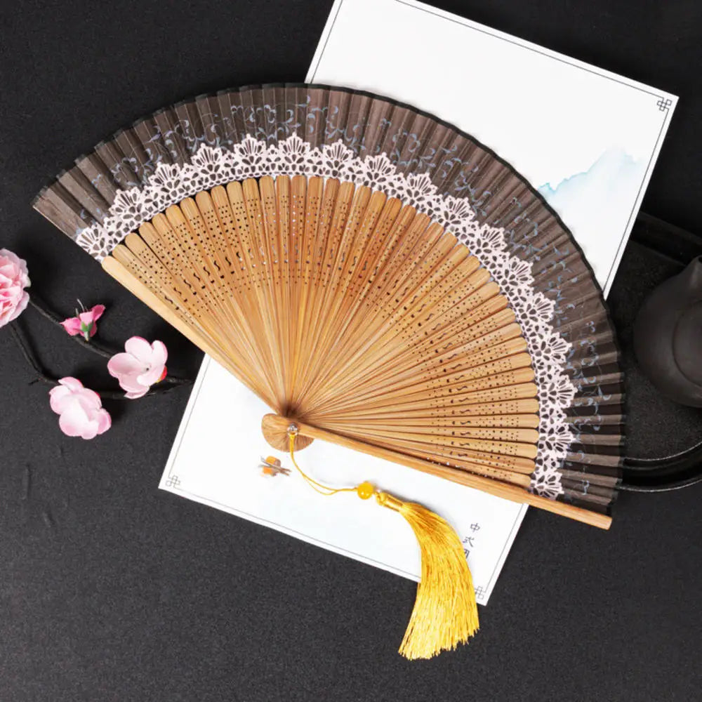 Traditional Bamboo Folding Fan with Solid Color Design