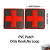 A pair of red cross patches with black backgrounds, designed as a hook for tactical or morale use.