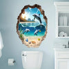 A wall sticker depicting a dolphin jumping out of a broken plaster effect into blue ocean water.