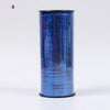 A roll of glitter curling ribbon in blue and purple hues.