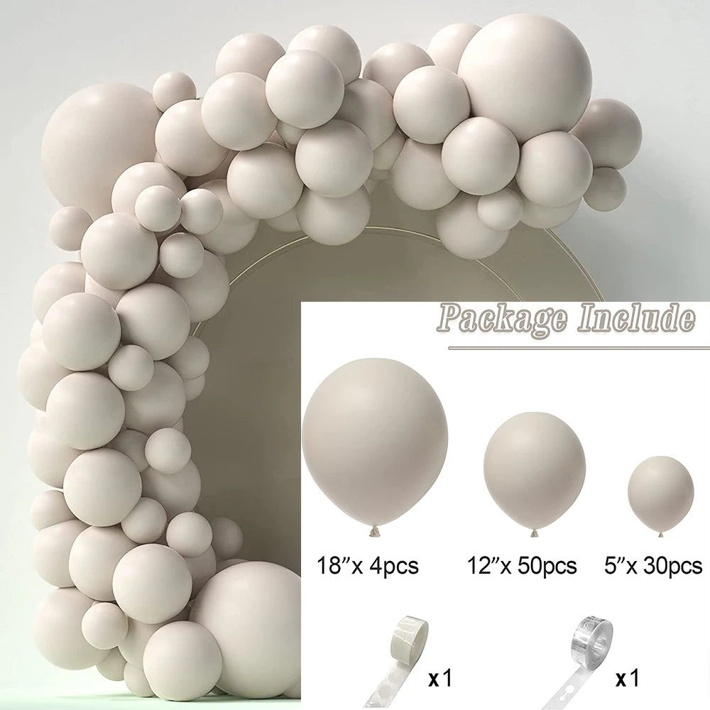 A white balloon garland arch kit featuring round balloons and a ribbon for parties and celebrations.