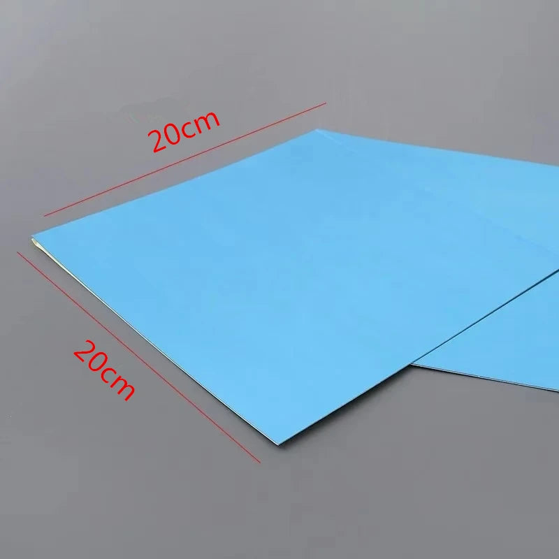 A sheet of light blue self-adhesive acrylic mirror wall sticker measuring 20cm by 20cm.
