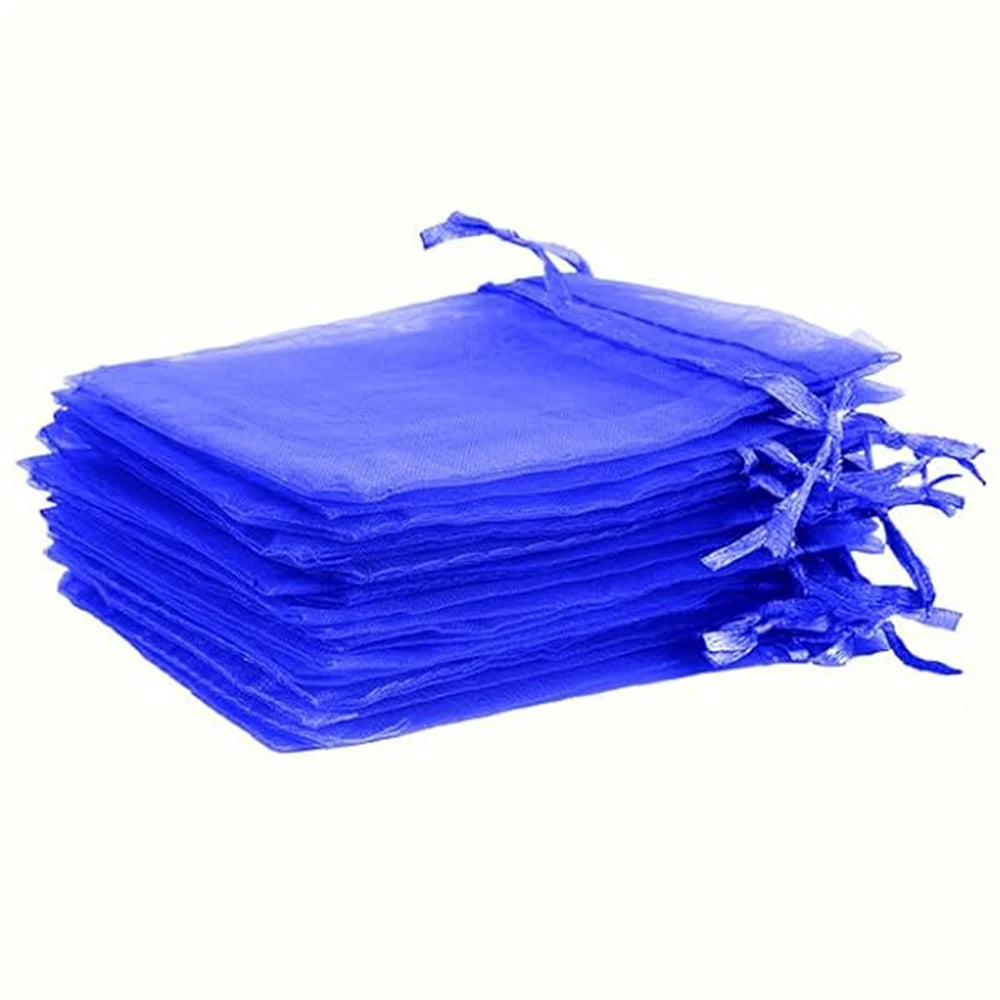 A stack of elegant blue organza drawstring bags with gold accents.