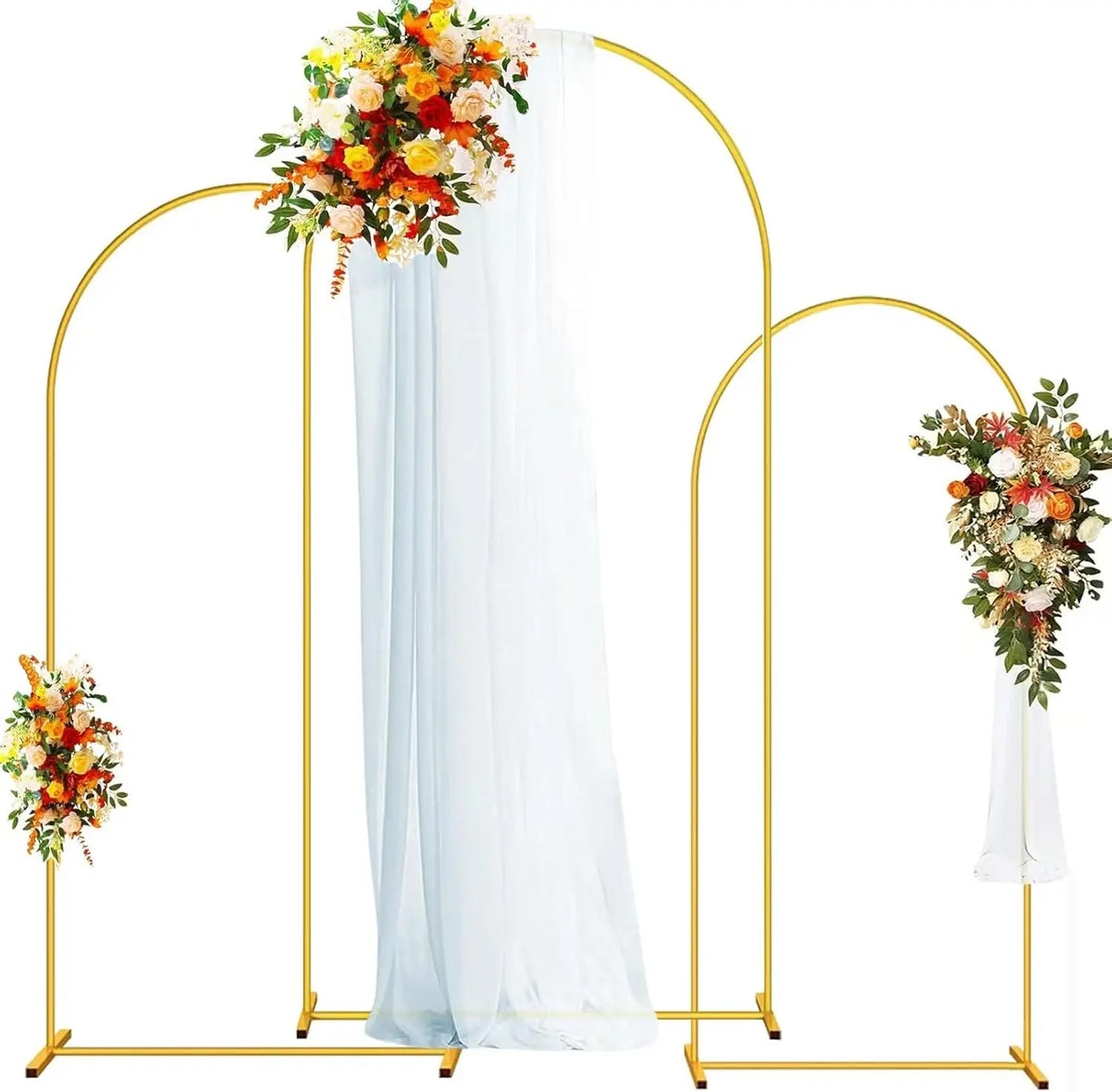 A gold metal arched wedding backdrop stand set featuring a sheer white fabric drape and floral arrangements.