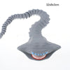 A gray, flexible sea monster fidget toy with a serpentine body and an open mouth showing teeth.