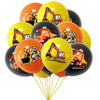 A bunch of orange and yellow latex balloons shaped like construction tractors and excavators.