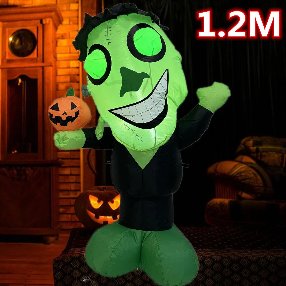 A green inflatable monster decoration with glowing eyes and a carved pumpkin, displayed in a dark setting.