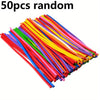 A pile of 50 random colored latex modeling balloons in various bright colors.