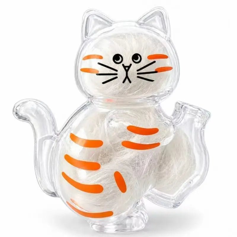 A clear capsule cat figurine with orange stripes, designed as a whisker keepsake magnet.