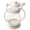 A white decorative metal candlestick lantern with a glass globe and wire arms.
