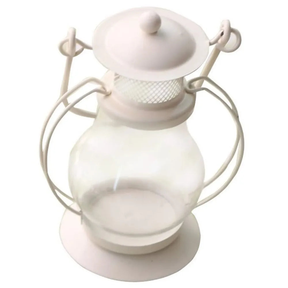 A white decorative metal candlestick lantern with a glass globe and wire arms.