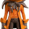Figurine de citrouille orange d'un personnage portant une cape orange et des bottes marron.