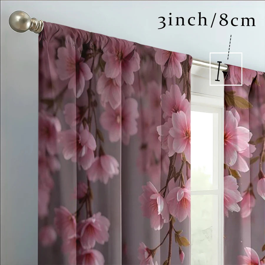 Light pink cherry blossom sheer curtains in a rod pocket style hanging in a window frame.
