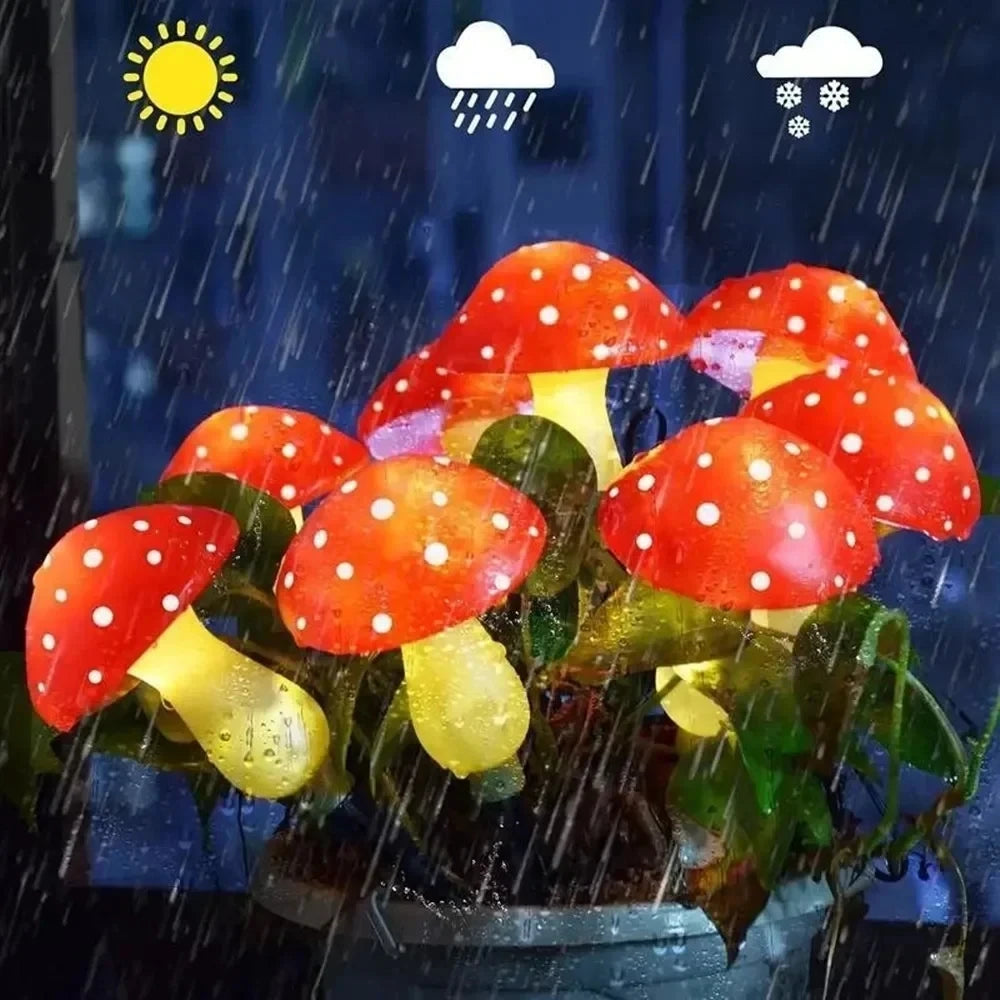Set of six solar mushroom garden lights with red and yellow illumination in a rainy outdoor setting