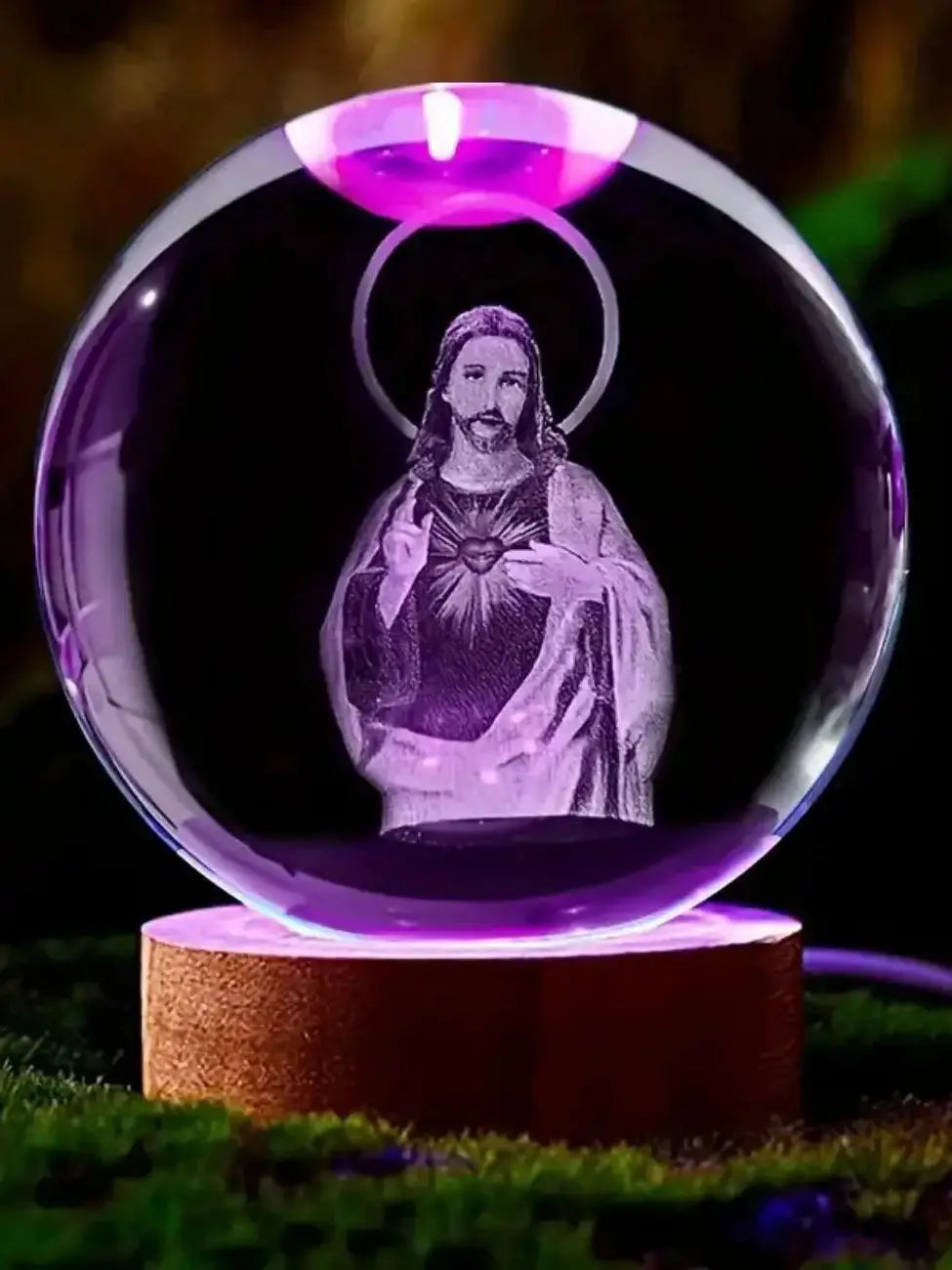A 3D crystal ball night light featuring a silhouette of Jesus with a halo, glowing purple.