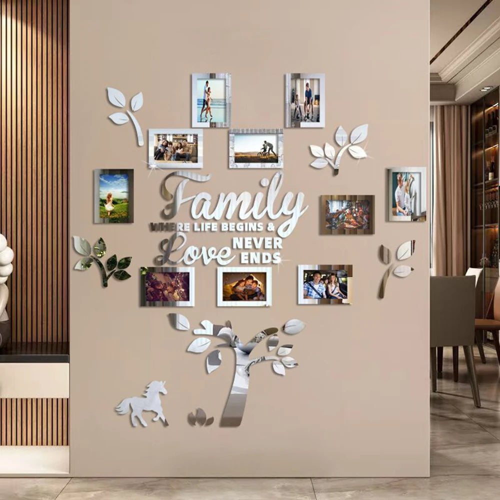 A wall featuring a decorative photo tree design with framed family pictures on a beige wall.