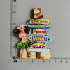 A collection of colorful fridge magnets featuring scenic locations like Sunset Beach, Paradise Cove, and Hawaii.