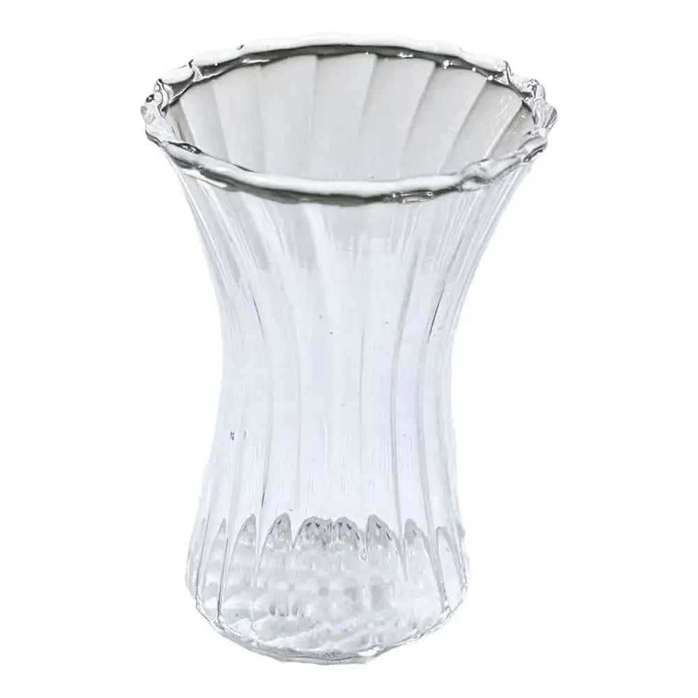 Handcrafted blue glass flower sculpture with a flared rim and tapered body.