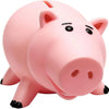 A pink cartoon piggy bank shaped like a pig, designed for saving coins.