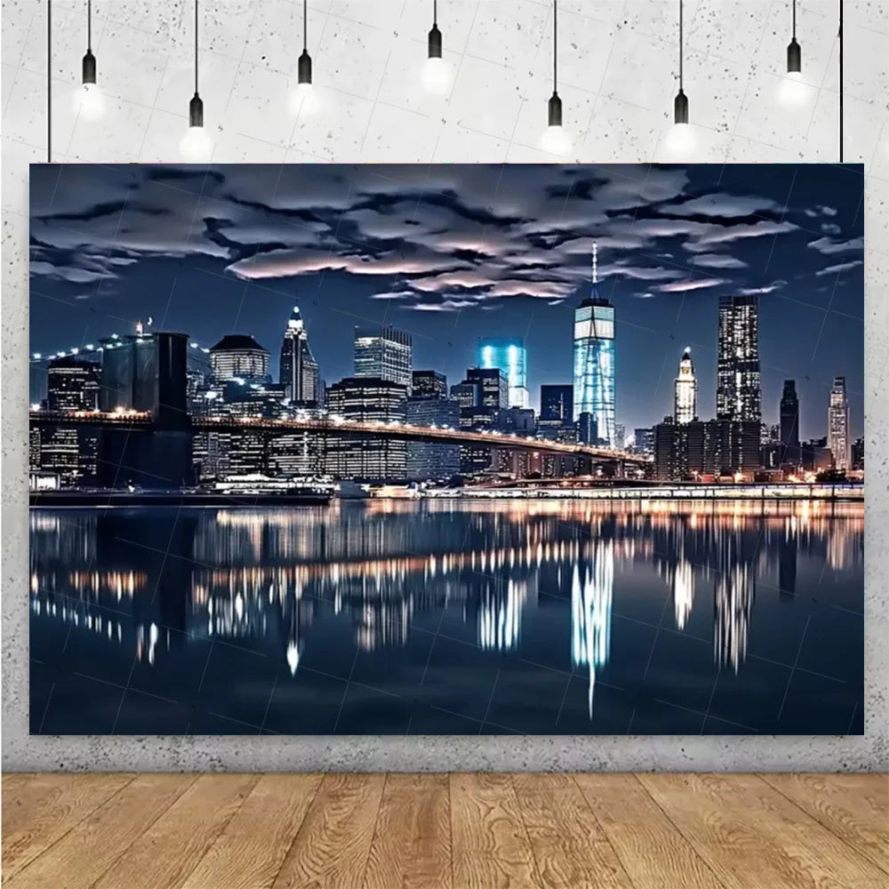 A photograph of a nighttime city skyline featuring illuminated high-rise buildings reflected in calm water under a dramatic c