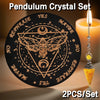 A black wooden pendulum crystal set featuring a pentagram design and a yellow rose quartz crystal necklace.