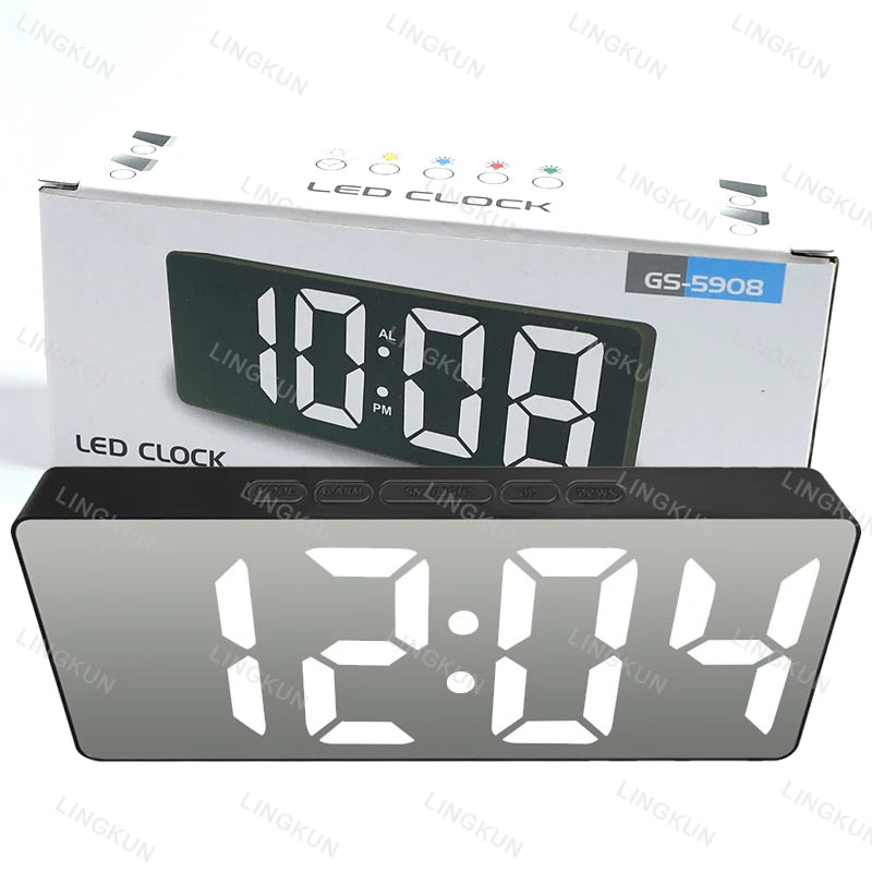 A black LED digital clock display showing 12:04 on a white box.